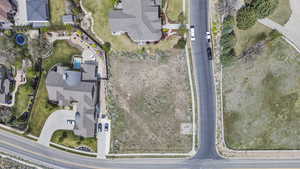 Aerial overview of property's location featuring nearby suburban area