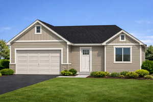 View of front facade with board and batten siding, asphalt driveway, stone siding, and a front yard