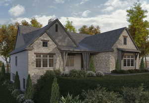 View of front of property with stone siding