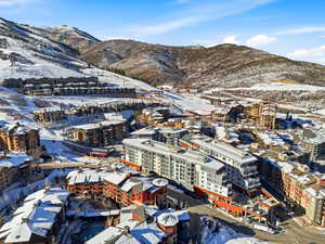 Snowy aerial view with a mountain view