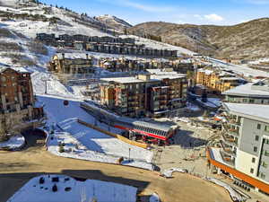 Snowy aerial view with a mountain view