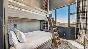 Bedroom featuring baseboards
