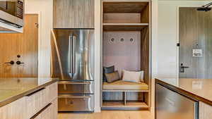 Mudroom featuring light wood-style flooring