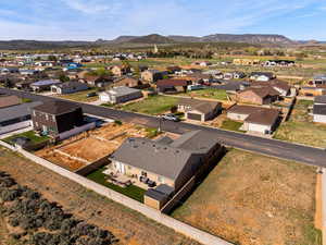 Aerial view of residential area featuring mountains