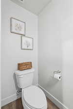 Bathroom featuring dark wood finished floors