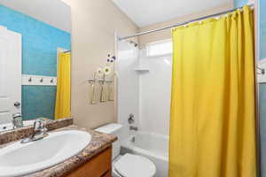 Full bath with vanity and shower / bathtub combination with curtain