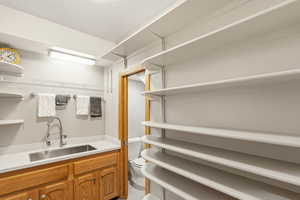 3/4 bathroom with shelving
