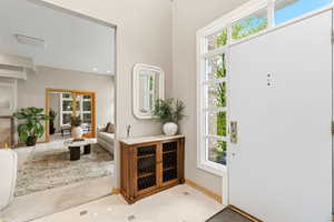Entryway featuring plenty of natural light and recessed lighting