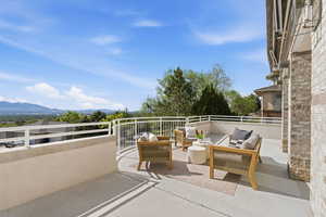 View of patio / terrace featuring an outdoor hangout area and a mountain view