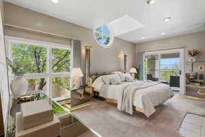Bedroom with access to exterior, carpet, and recessed lighting