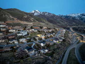 Aerial view of residential area featuring a mountain backdrop