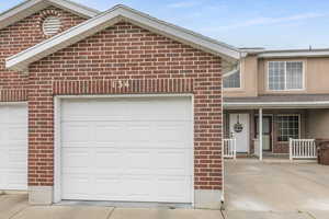 Garage with concrete driveway
