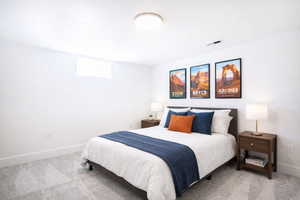 (virtual staging) Bedroom with light colored carpet