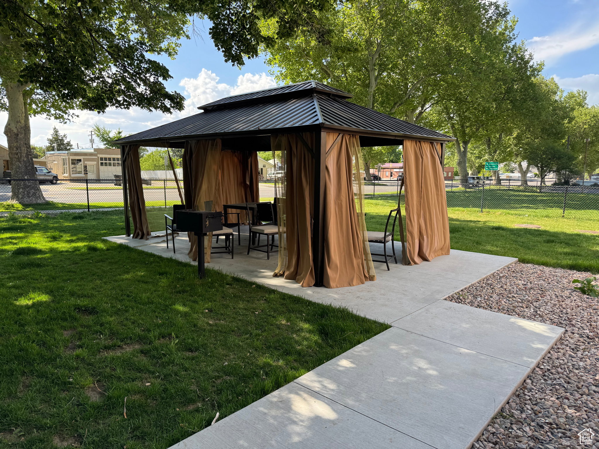 View of community featuring a gazebo and a patio