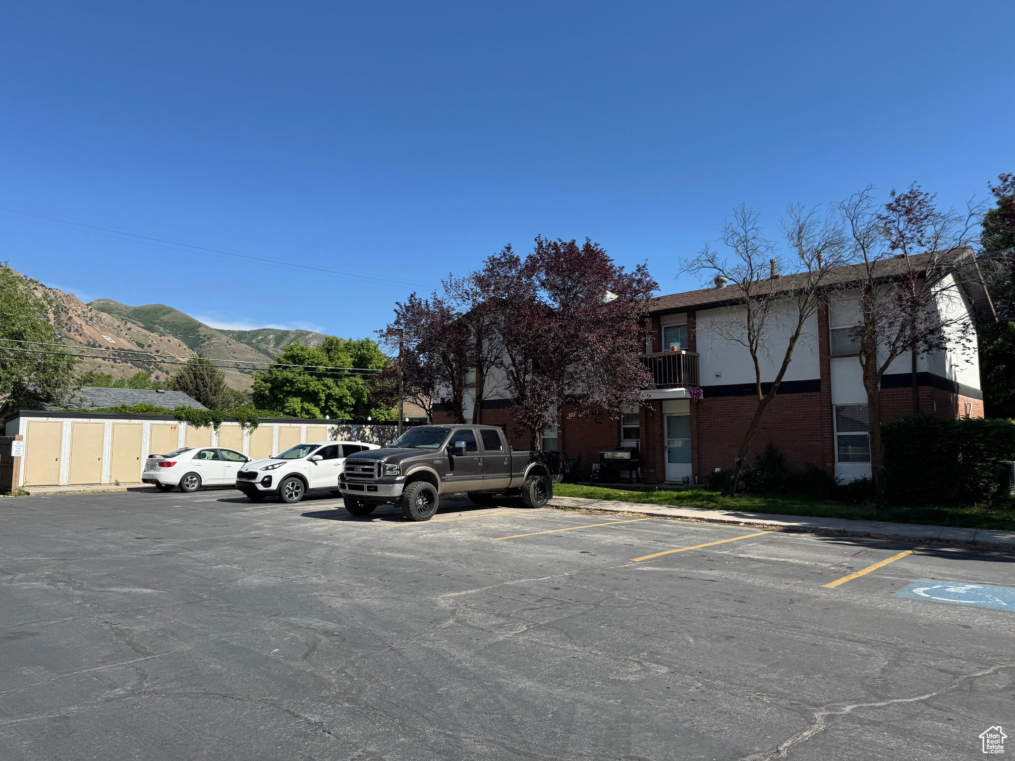Uncovered parking lot with a mountain view