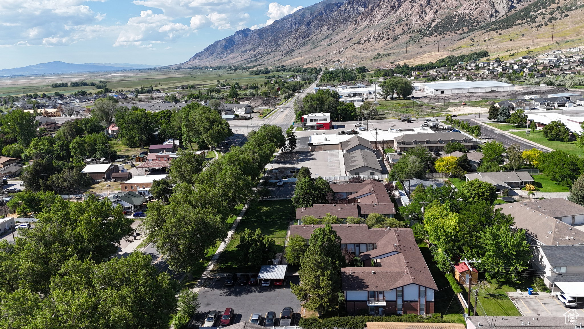 Aerial perspective of suburban area featuring mountains