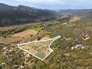 Aerial view of sparsely populated area with mountains