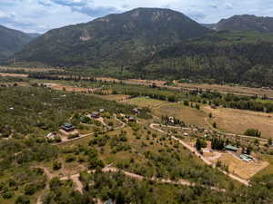 Aerial view of sparsely populated area with mountains