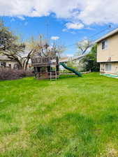 View of yard with a playground