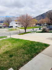 View of yard featuring a mountain view and a residential view