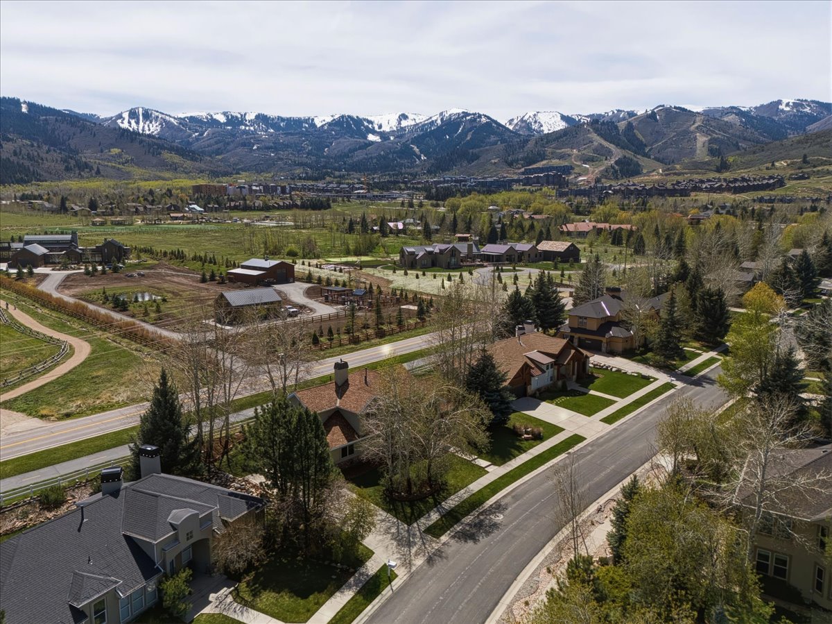 View of property location with nearby suburban area
