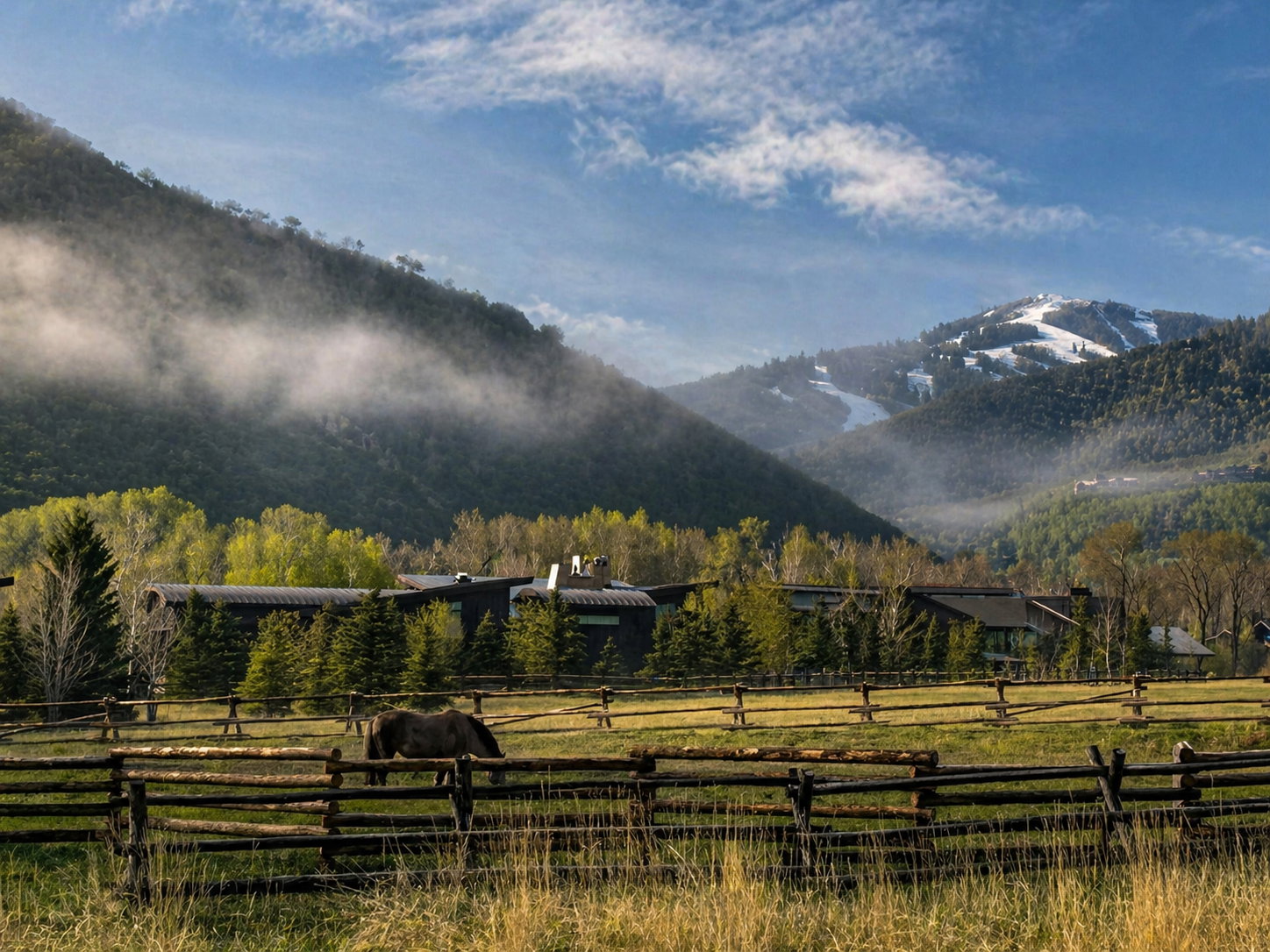 View of mountain backdrop featuring rural landscape and agricultural land