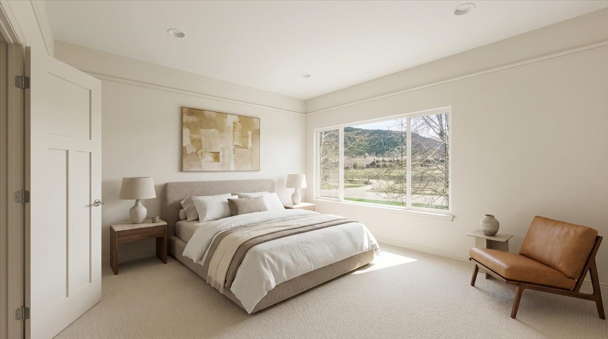 Bedroom featuring light colored carpet and a mountain view