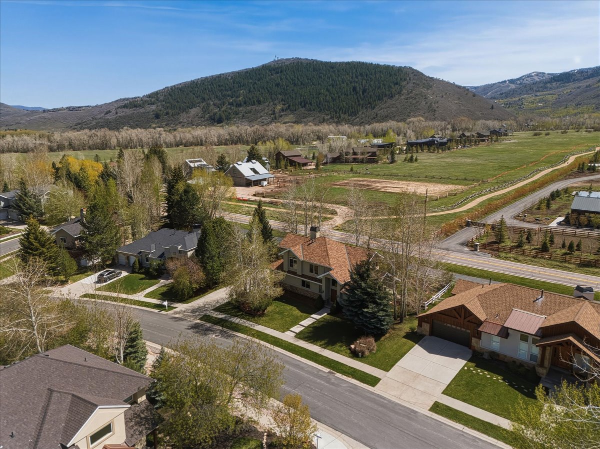 Aerial perspective of suburban area featuring mountains