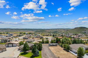 Aerial perspective of suburban area featuring mountains