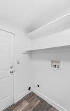 Laundry area featuring dark wood-style floors, washer hookup, hookup for an electric dryer, and crown molding