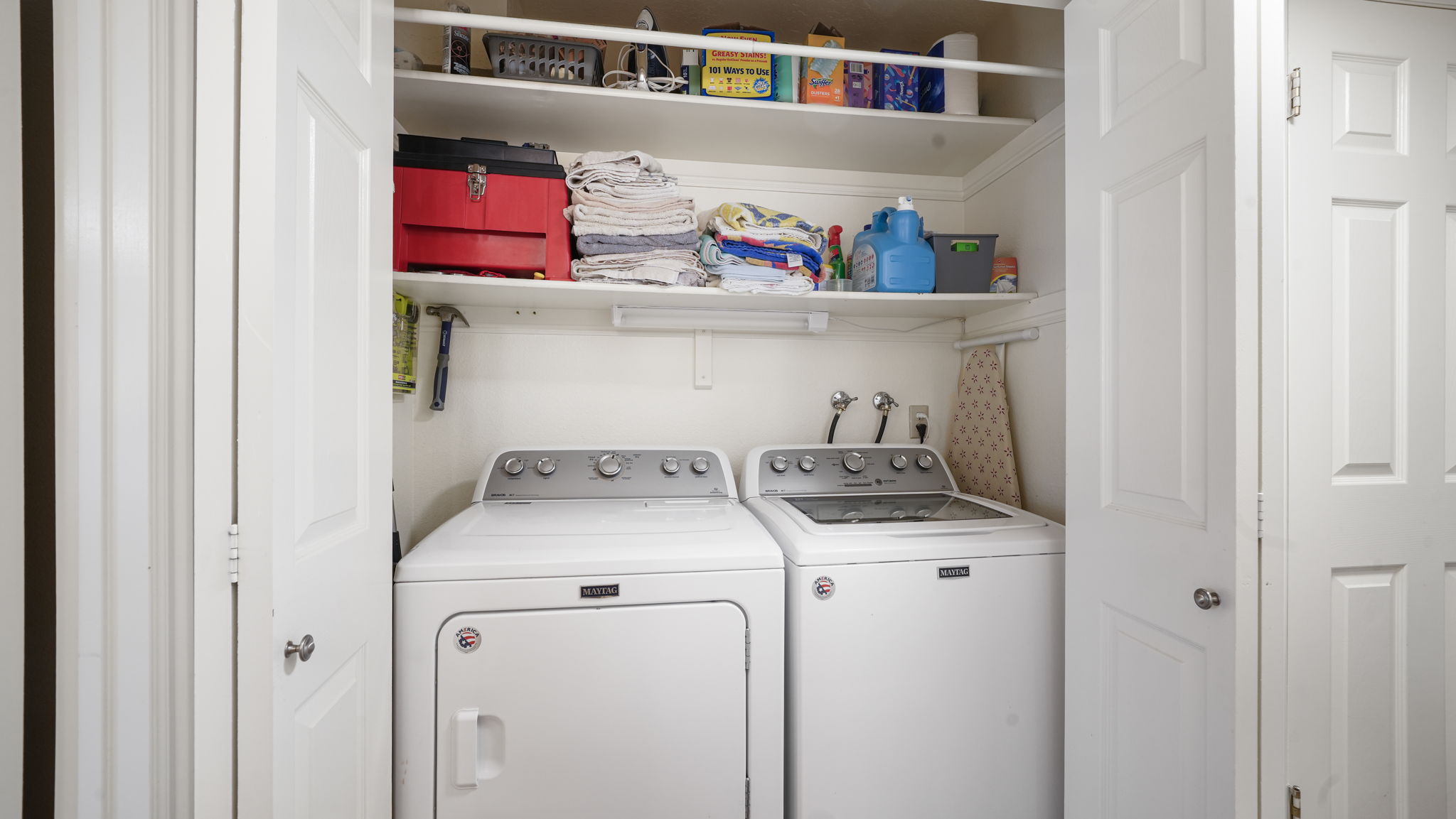 Laundry area featuring separate washer and dryer