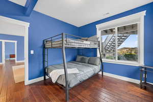 Bedroom featuring dark wood finished floors