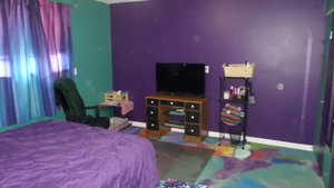 Bedroom with baseboards