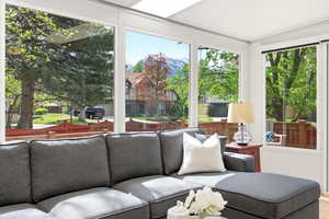 Sunroom / solarium featuring unobstructed view of the mountain.