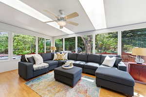 Sunroom / solarium with wood finished floors