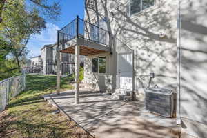 View of patio / terrace with a wooden deck and entry steps