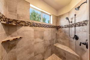 Bathroom with a tile shower