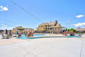 Community pool with a patio area