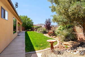 View of fenced backyard