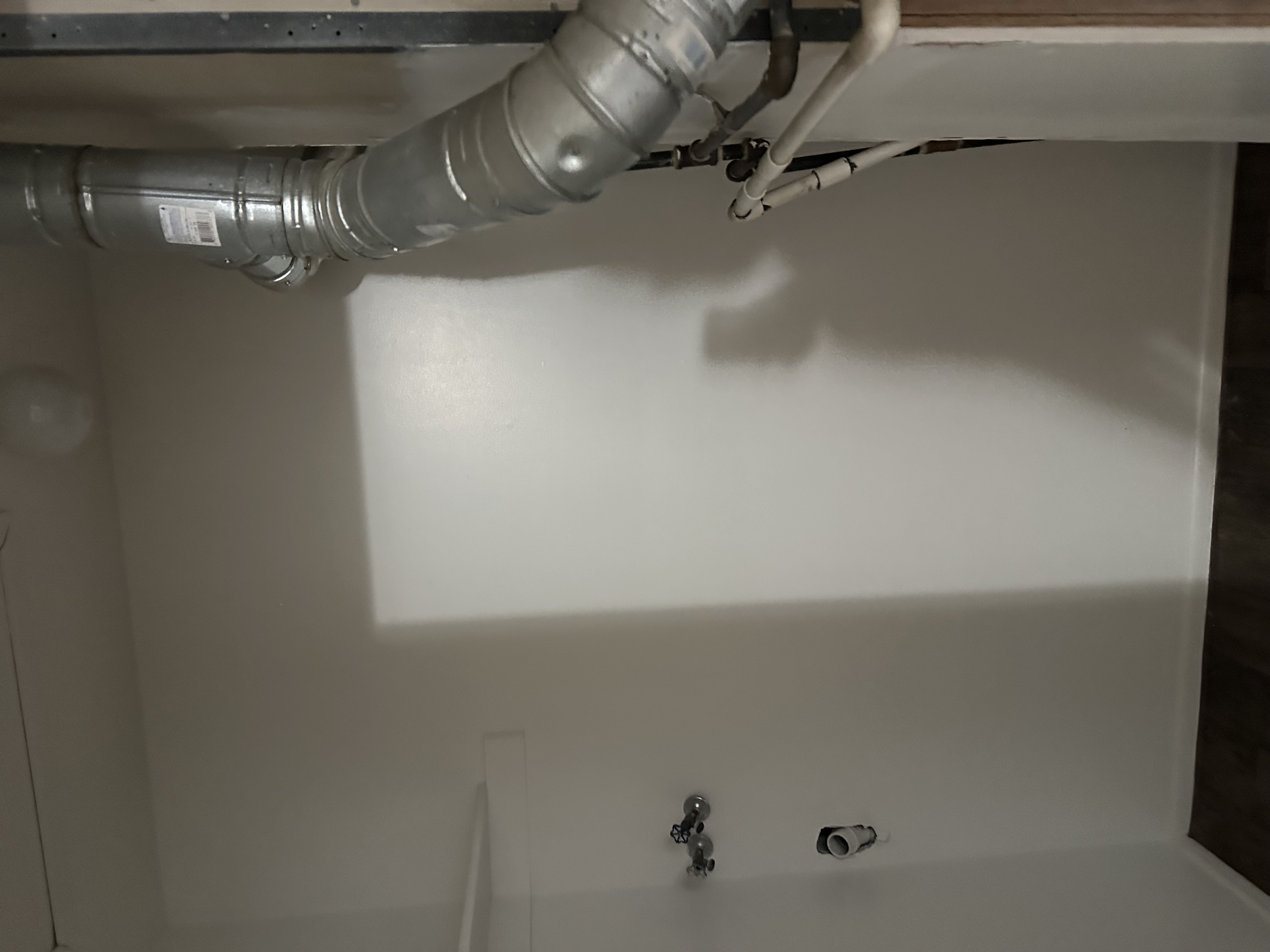 Detailed view of baseboards and wood finished floors