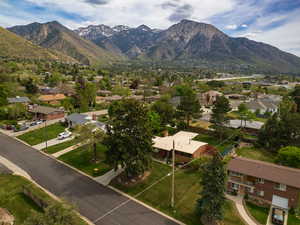 View of mountain backdrop with nearby suburban area