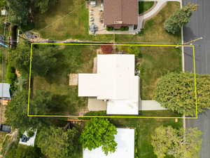 Aerial overview of property's location featuring property boundaries highlighted