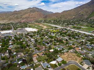 Aerial view of residential area with a mountainous background