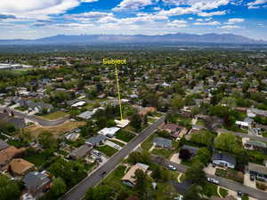 Aerial perspective of suburban area featuring mountains