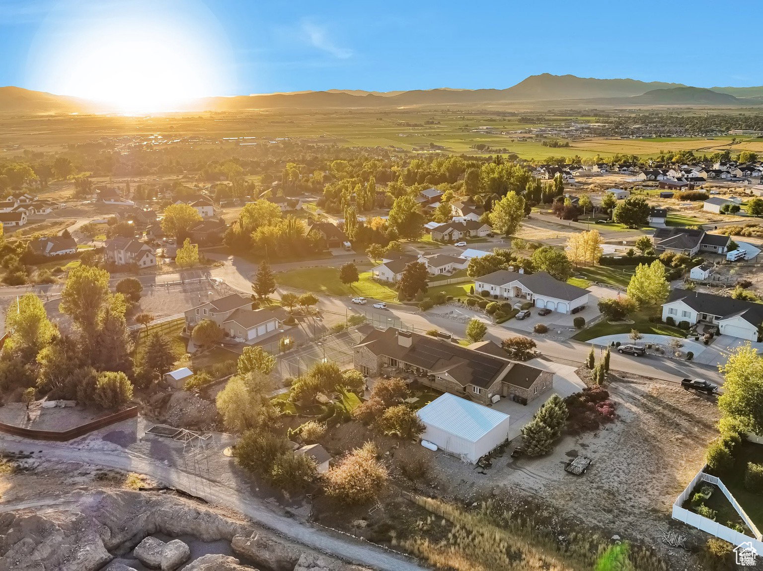 Aerial view of residential area with a mountainous background