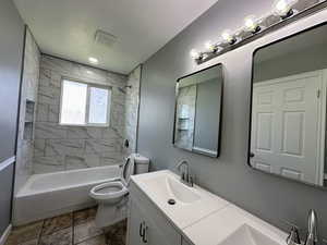 Full bath with  shower combination and double vanity