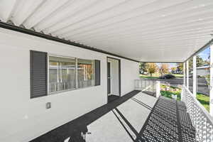 Covered porch with a carport