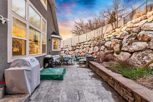 View of patio featuring area for grilling