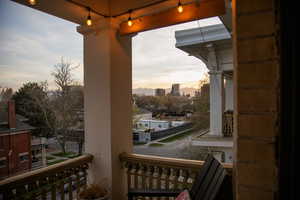View of balcony at dusk