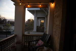 View of balcony at dusk